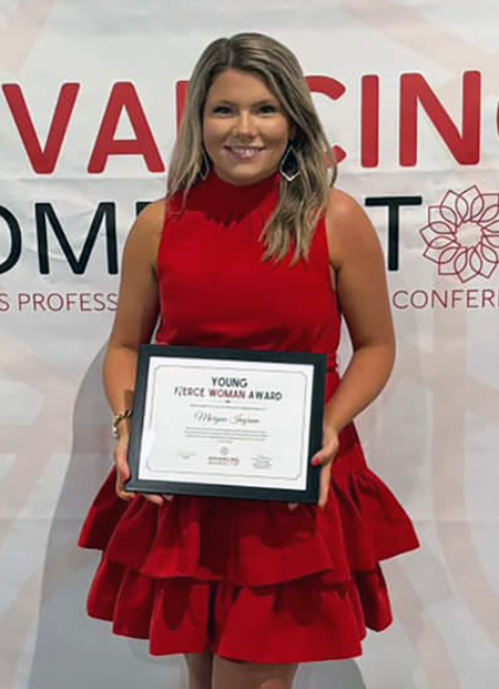 Morgan Ingram holding award