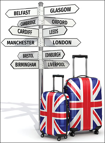 Suitcases in front of steet signs with locations in England