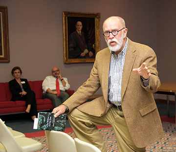 Author Sonny Brewer reads from his book at a 2015 Friends of the Library book talk at the library.