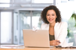 female student sitting behind her laptop computer