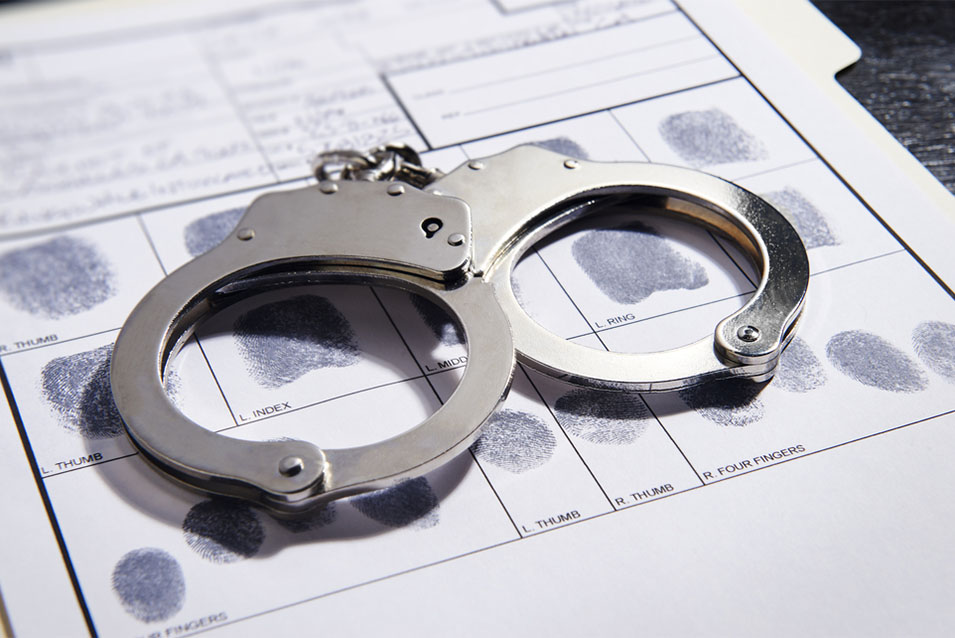 Crime Statistics image with handcuffs