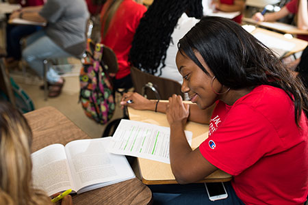 A female social work student studies with a classmate