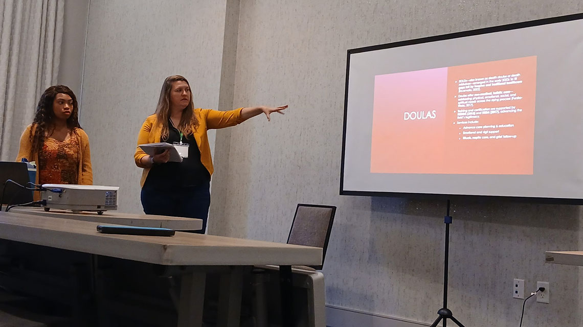 Dr. Donley and Sassy Pilkington presenting at MidSouth Sociological Association