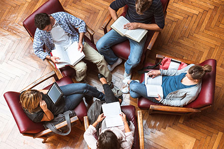 students sit in a circle