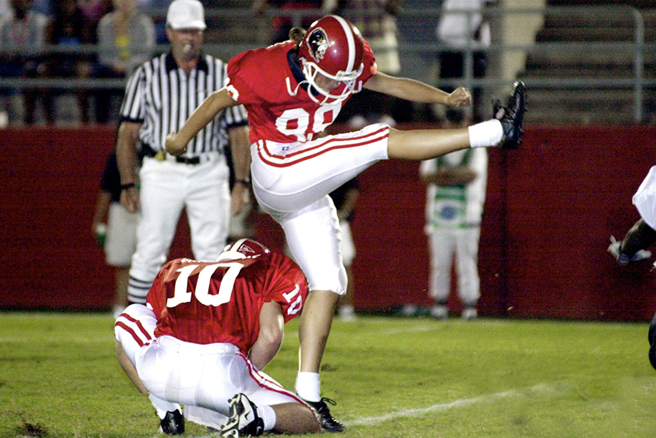 Ashley Martin kicks and scores