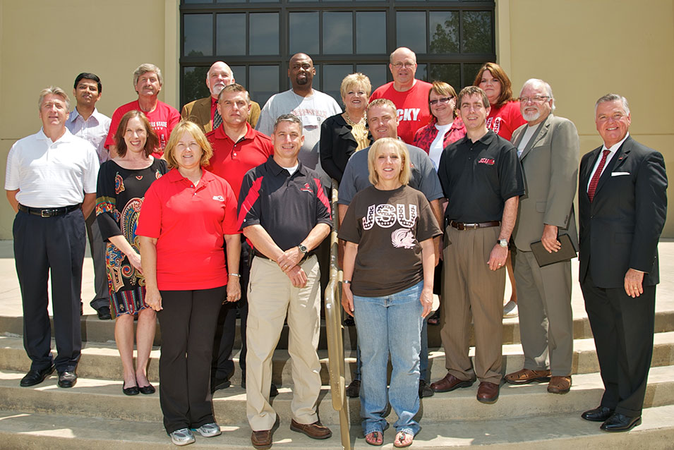 JSU's first EM doctoral cohort, pictured with JSU administrators and faculty