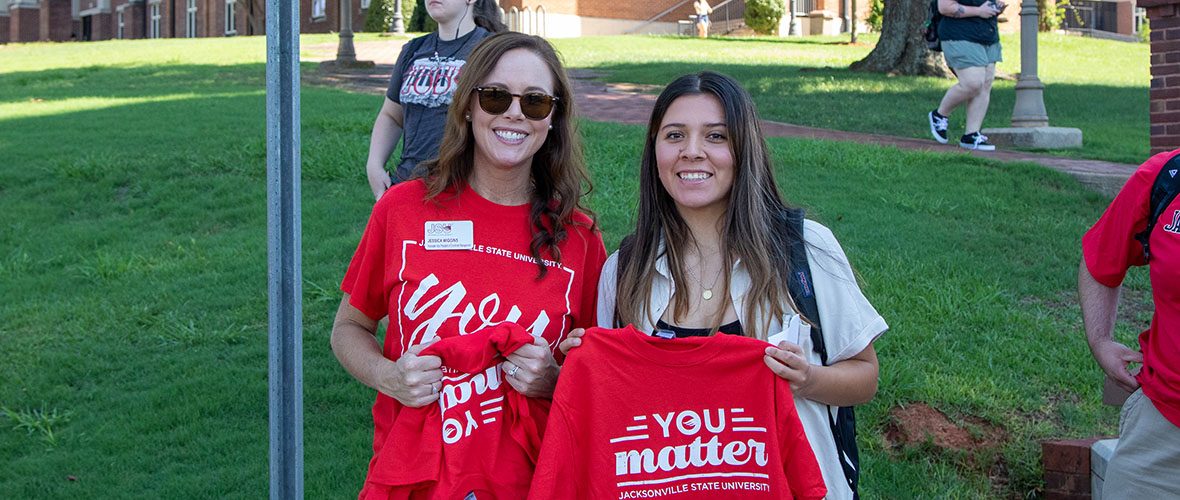 Jessica Wiggins handing out You Matter shirts