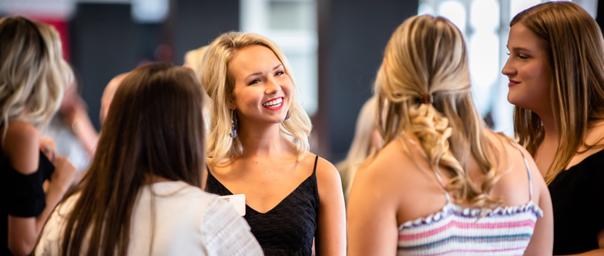 Potential New Members Speak to Sorority Members at the Summer Social