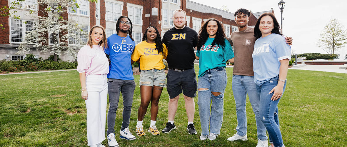 Fraternity and Sororities members in front of Angle Hall