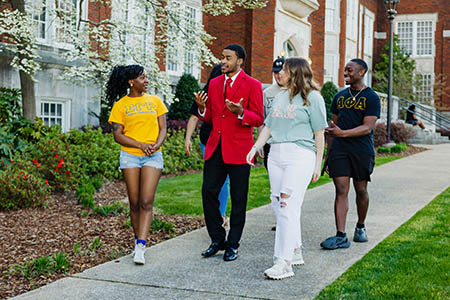 Students walking in front of Angle Hall