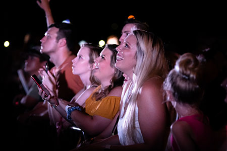 Students listening to band at Spirit on Mountain Street