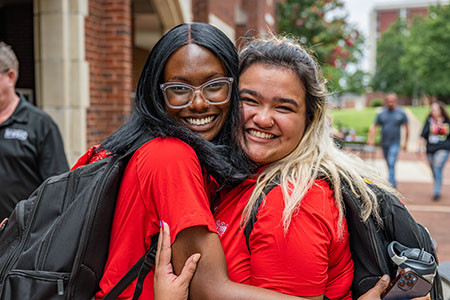 Students hugging on the Quad