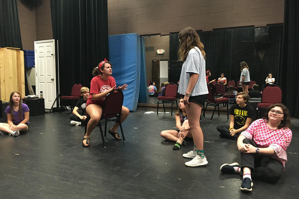 Students rehearsing a play