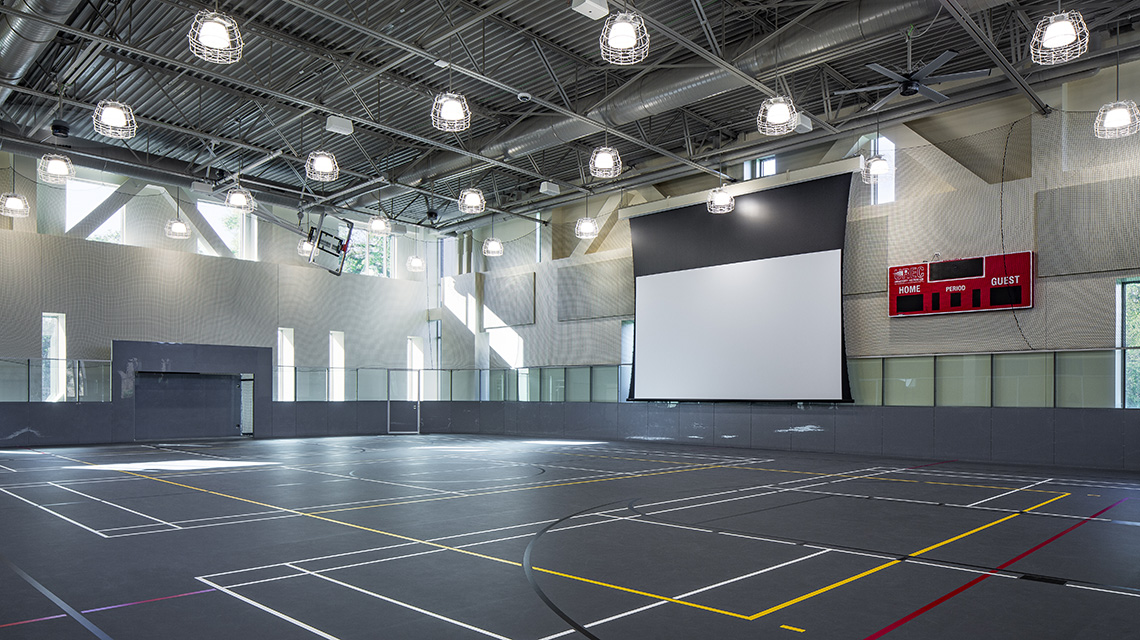 rubber sport court with projector screen set up